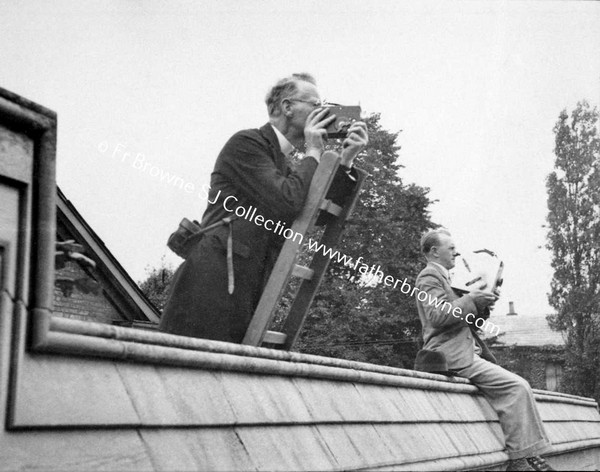 NATIONAL PILGRIMAGE TO WALSHINGHAM  FILMING PROCESSION FROM TOP OF LADDER   BY CLAUDE FISHER